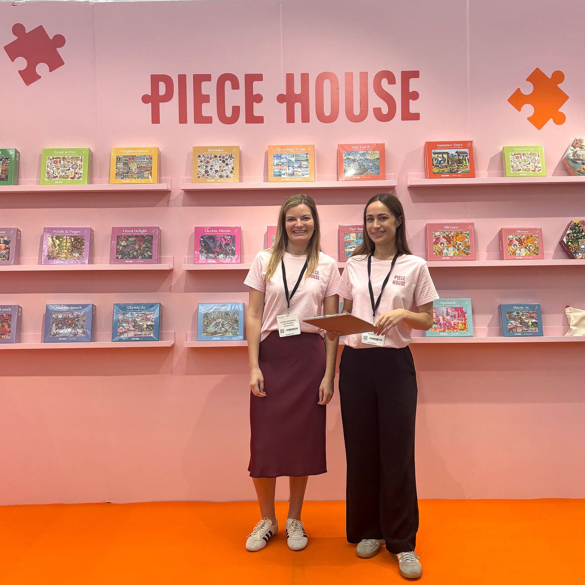New Zealand artist jigsaw puzzles displayed at a London tradeshow stand